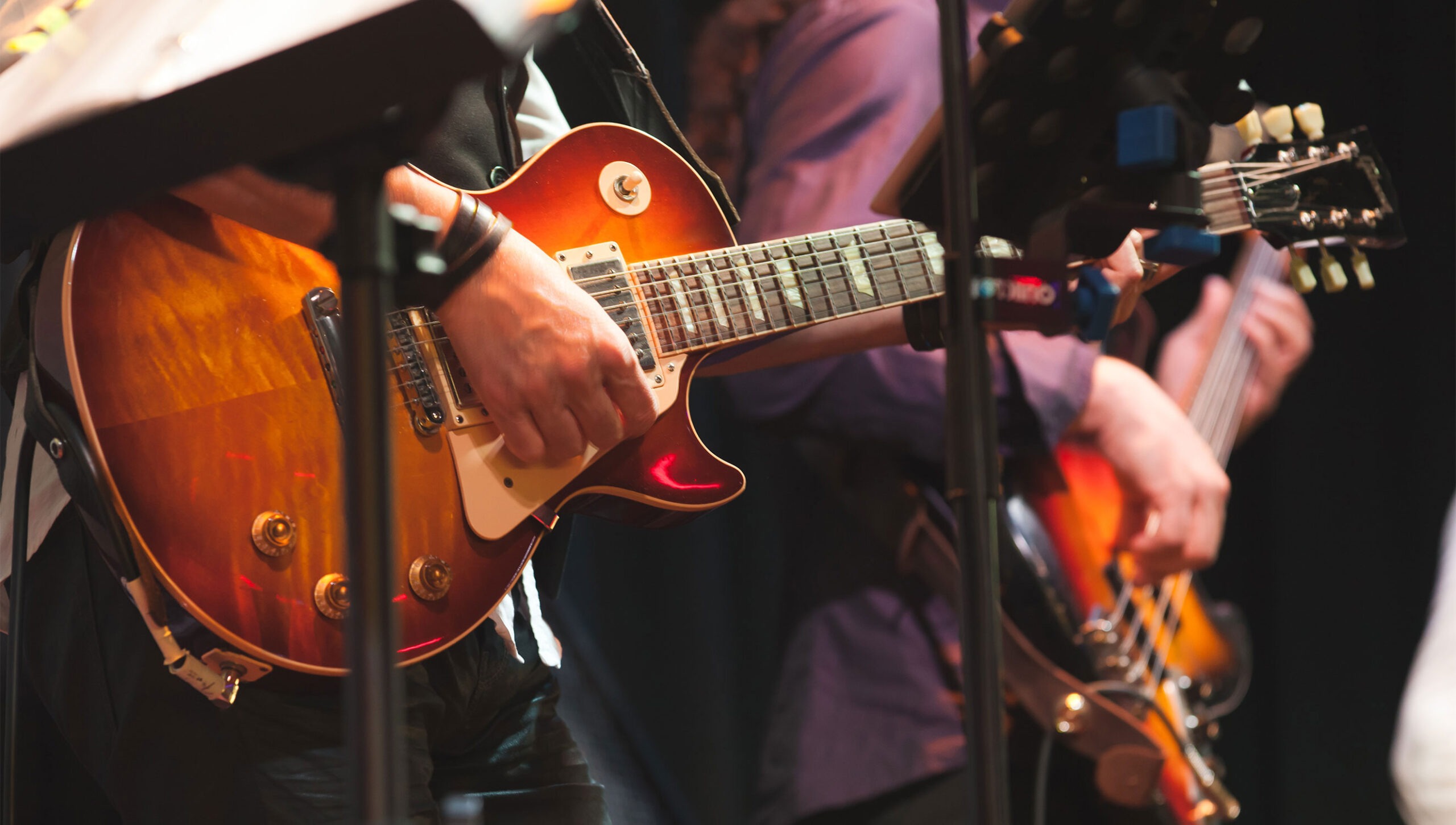 Southland Live Entertainment featuring two people playing guitar