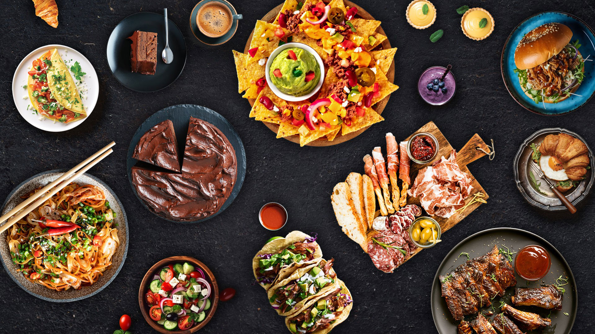 Featured Southland Casino catering food items on a black concrete surface.